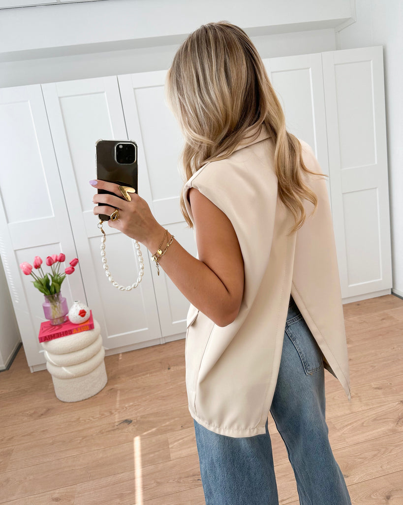 Beige gilet met knopen en open rug detail